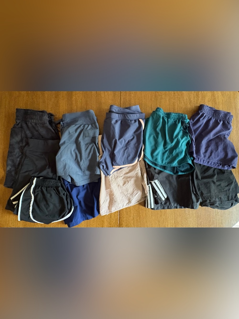 Closet clean out 11 assorted athletic shorts/ skorts. Large med and one small